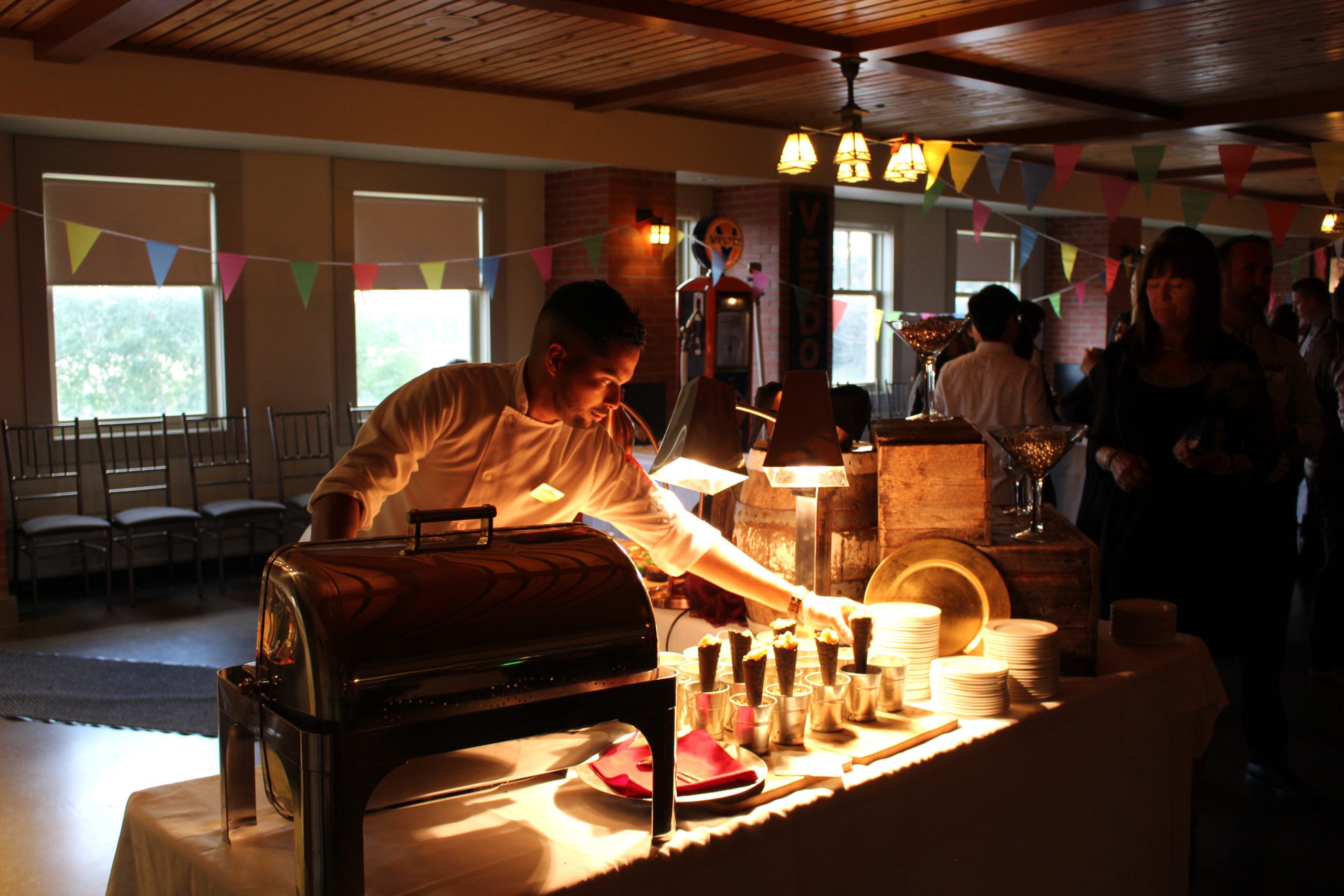 A chef prepares a gourmet dinner at Carnivale in Heritage Park
