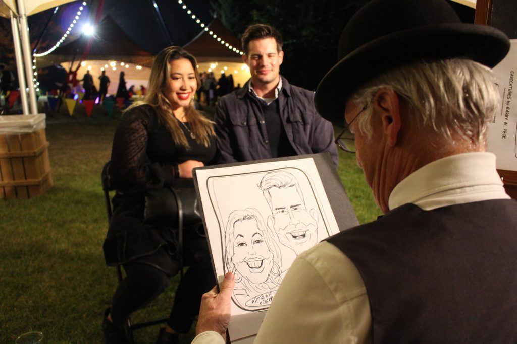 Caracture Drawing of a Couple during Carnivale 