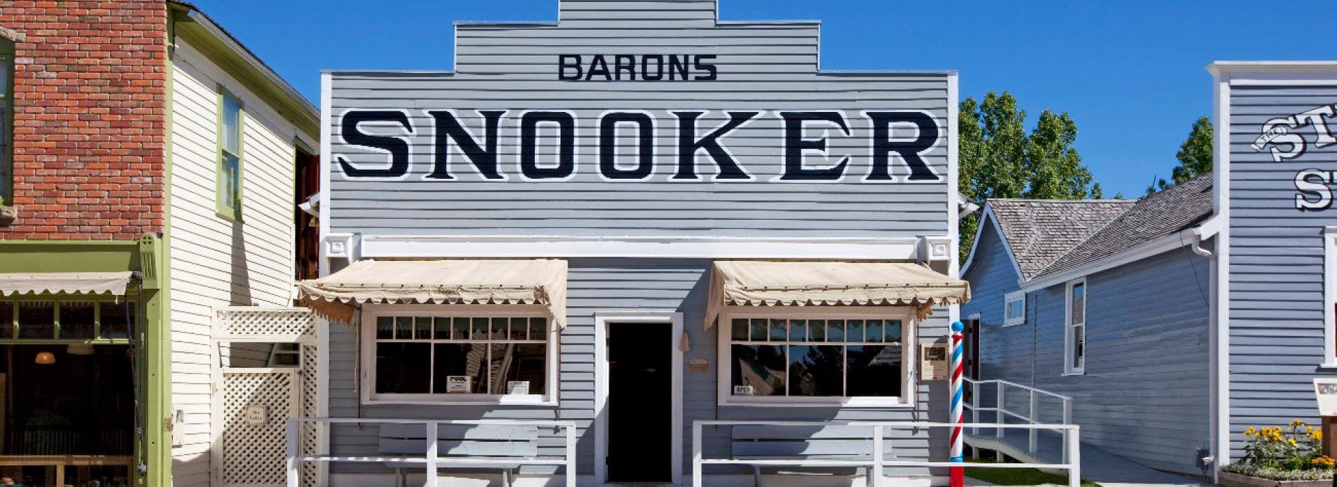 2 story building that says Barons Snooker