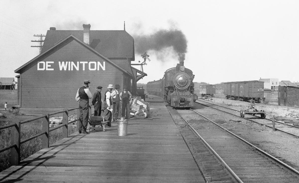 "Station at De Winton, Alberta.", [ca. 1910s], (CU1123210) by Unknown. Courtesy of Glenbow Library and Archives Collection, Libraries and Cultural Resources Digital Collections, University of Calgary.