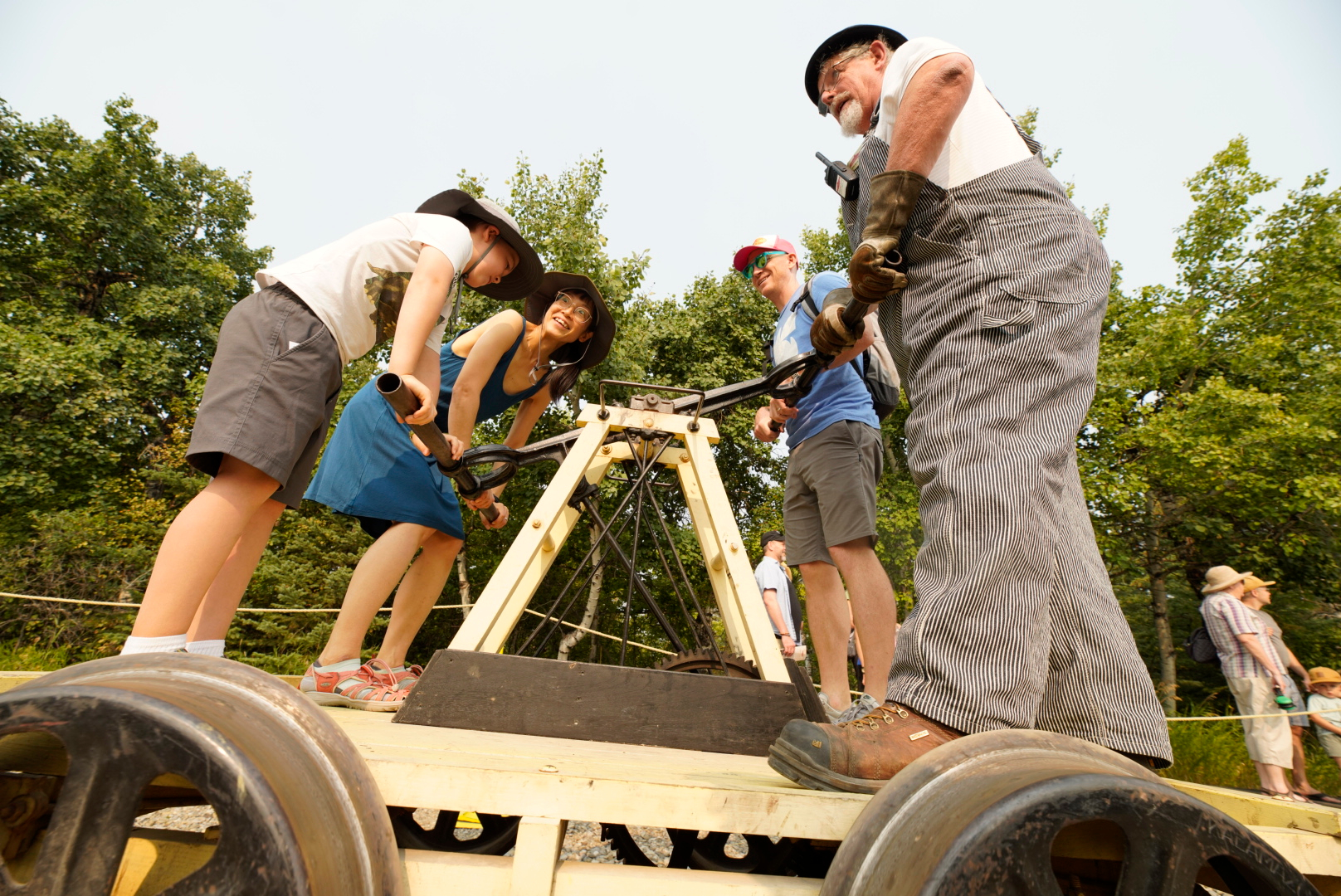 Family riding a handcar at Railway Days