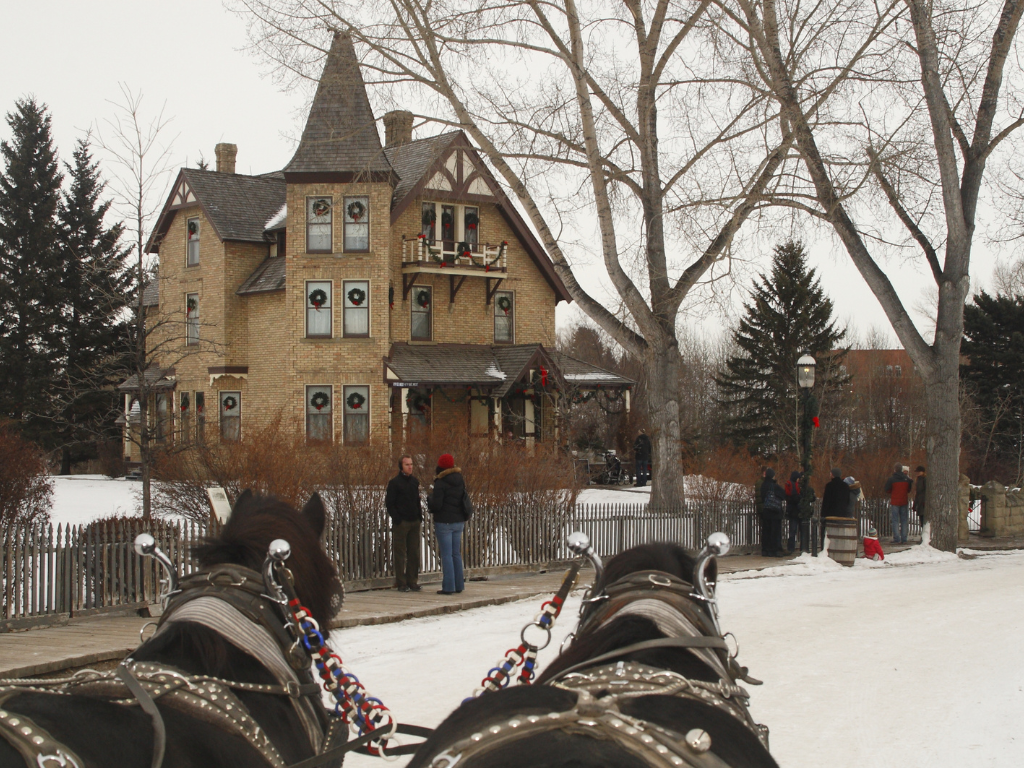 Horse-drawn Wagon Ride at Christmas Party in Calgary at Heritage Park