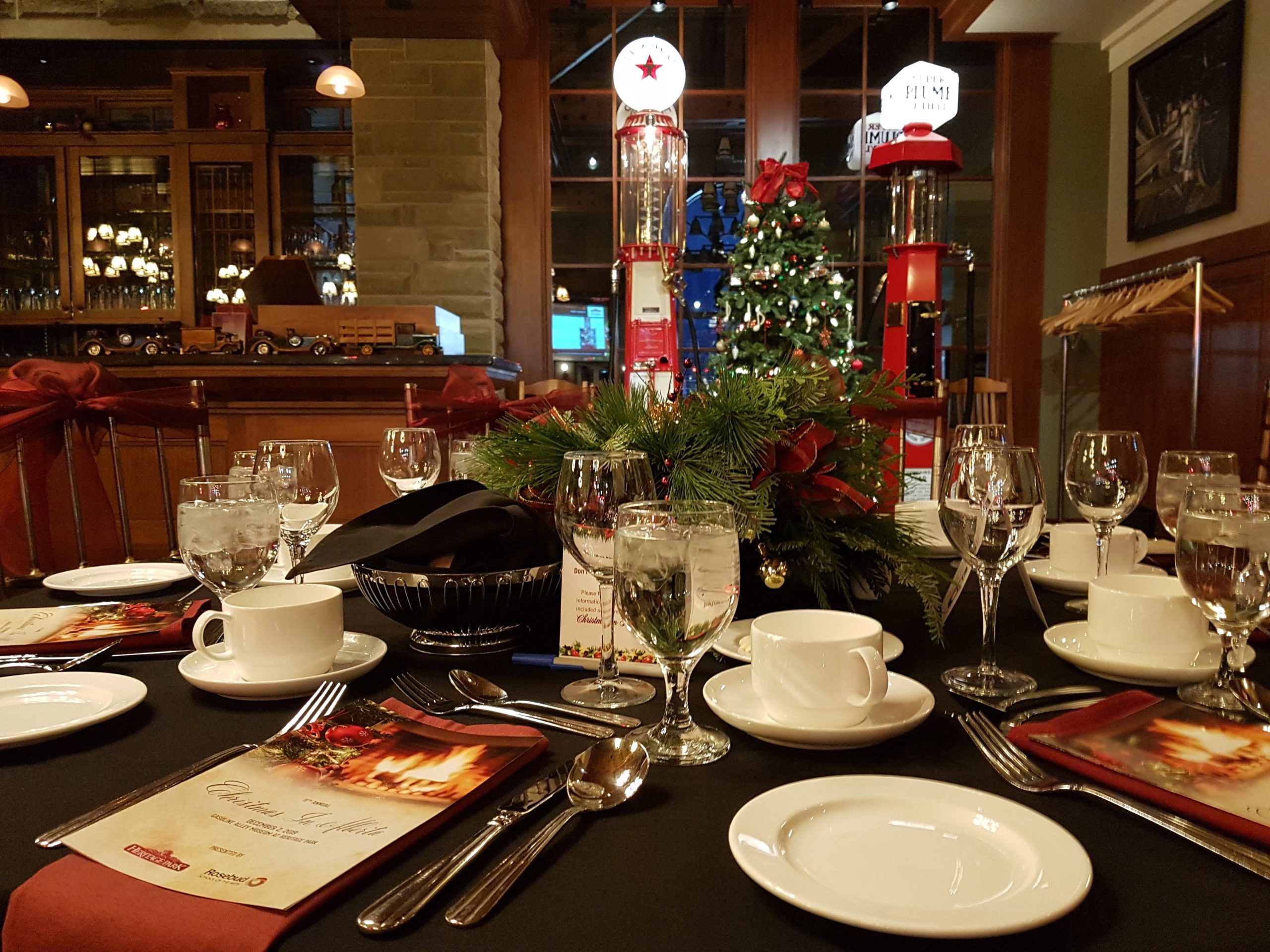Sit-Down Christmas Dinner setting at Calgary’s Heritage Park with Festive Centerpiece